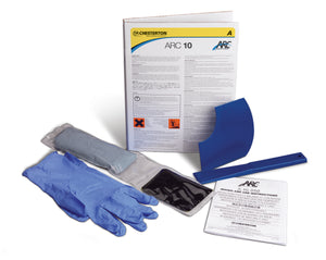 Chesterton ARC 10 kompositmaterial med tillbehör inklusive handskar, blandningsverktyg och instruktionsblad för industriell reparation.