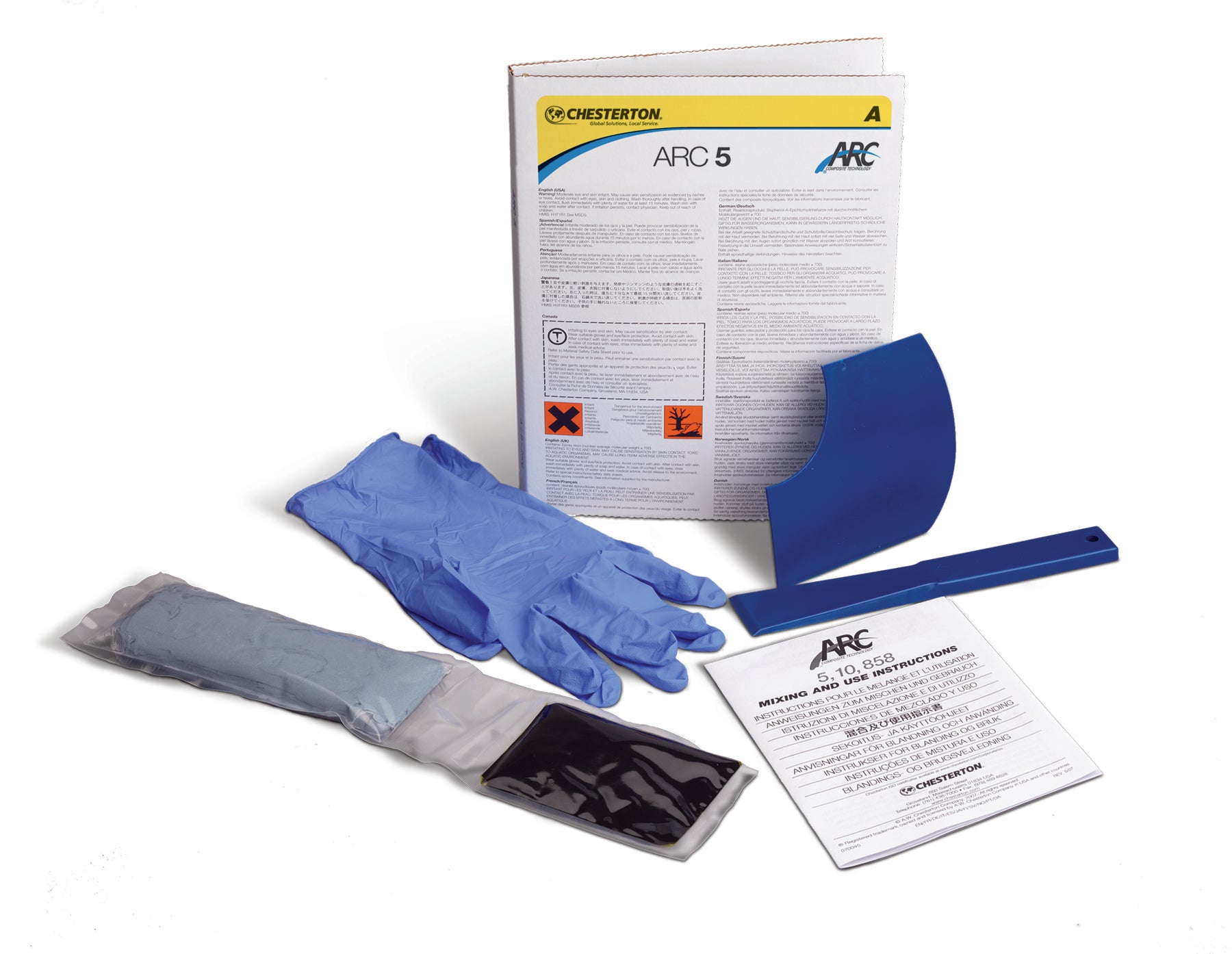 Chesterton ARC 5 kompositreparationssystem med tillbehör inklusive blandningsverktyg, skyddshandskar och instruktionsblad för industriell användning.