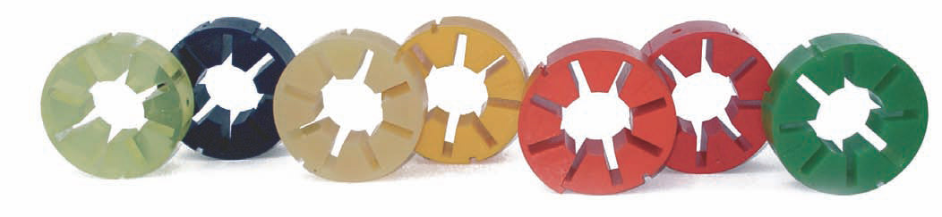 Stjärnformade kopplingselement i gul, svart, beige, orange, röd och grön för elastiska kopplingsapplikationer.